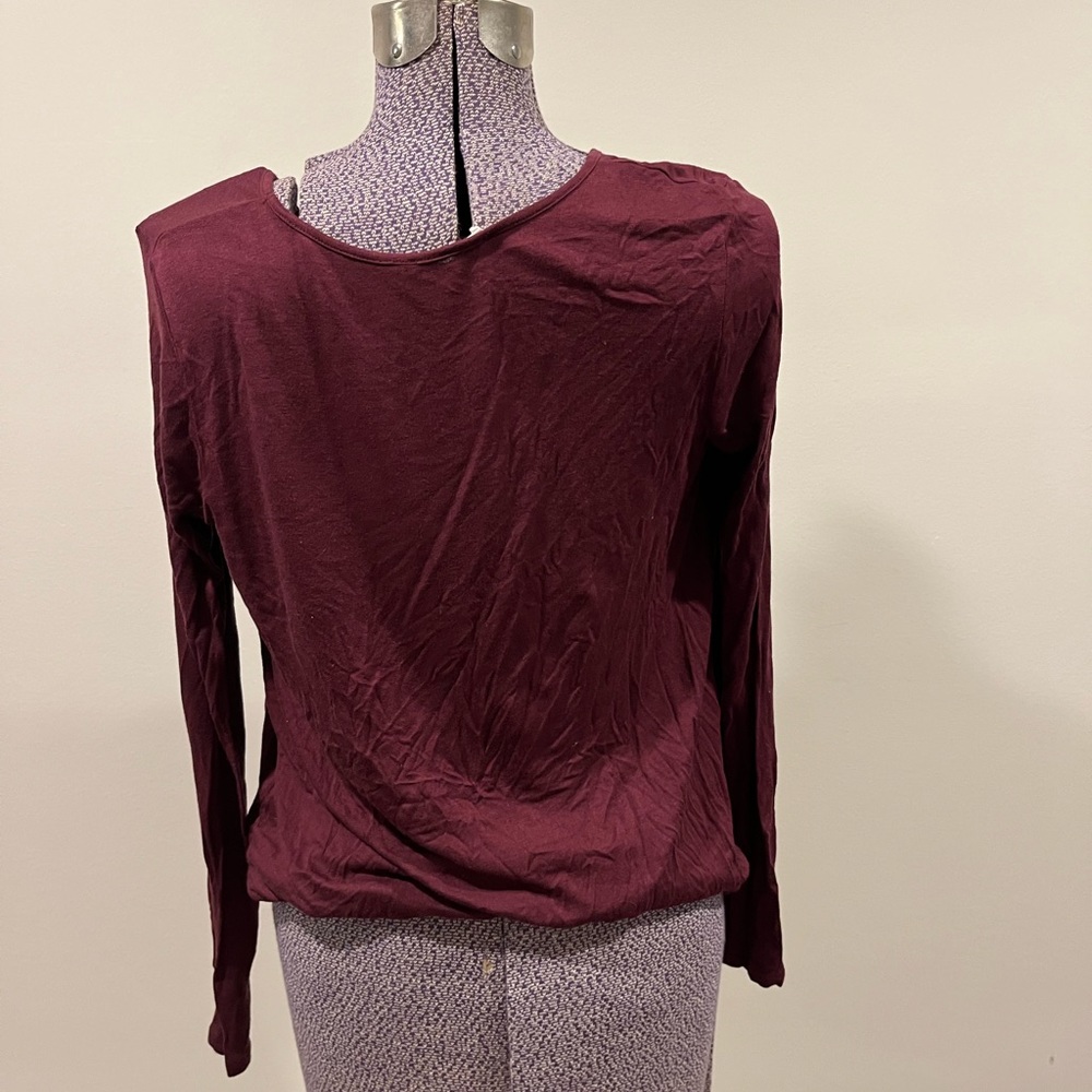 Maroon long sleeve with overlapping fabric in the front